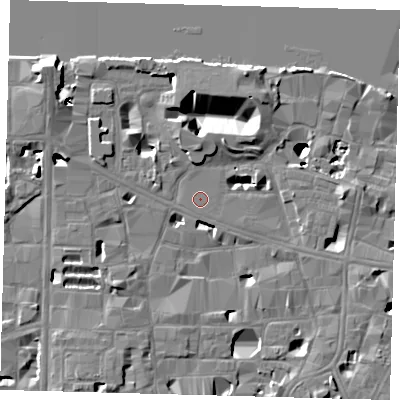 Shaded relief map of the ground around SE10SU, computed from Environment Agency LiDAR. The ground here sits at about 3 m above sea level and falls 16 m across the surrounding 800 m. Surface water reaching this point runs off ground lying to the north-north-east, 13.8 m higher.