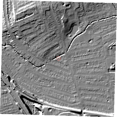 Shaded relief map of the ground around SE128LN, computed from Environment Agency LiDAR. The ground here sits at about 14 m above sea level and falls 15 m across the surrounding 800 m. Surface water reaching this point runs off ground lying to the north-north-west, 11.1 m higher.