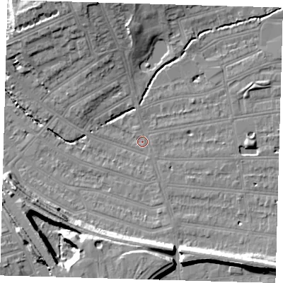 Shaded relief map of the ground around SE128LR, computed from Environment Agency LiDAR. The ground here sits at about 14 m above sea level and falls 15 m across the surrounding 800 m. Surface water reaching this point runs off ground lying to the north-north-west, 10.5 m higher.