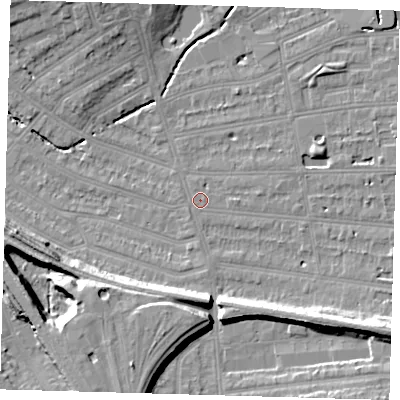 Shaded relief map of the ground around SE128LT, computed from Environment Agency LiDAR. The ground here sits at about 15 m above sea level and falls 16 m across the surrounding 800 m. Surface water reaching this point runs off ground lying to the south-south-west, 11.7 m higher.