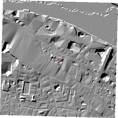 Shaded relief map of the ground around SE12EN, computed from Environment Agency LiDAR. The ground here sits at about 5 m above sea level and falls 29 m across the surrounding 800 m. Surface water reaching this point runs off ground lying to the east-north-east, 2.5 m higher.