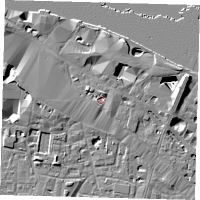 Shaded relief map of the ground around SE12ES, computed from Environment Agency LiDAR. The ground here sits at about 4 m above sea level and falls 29 m across the surrounding 800 m. Surface water reaching this point runs off ground lying to the north-north-east, 2.5 m higher.