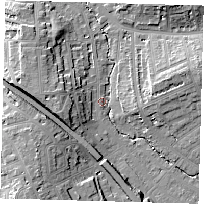 Shaded relief map of the ground around SE135HX, computed from Environment Agency LiDAR. The ground here sits at about 13 m above sea level and falls 22 m across the surrounding 800 m. Surface water reaching this point runs off ground lying to the south-west, 20.4 m higher.