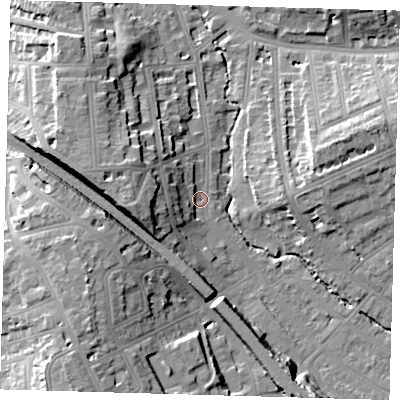 Shaded relief map of the ground around SE135HZ, computed from Environment Agency LiDAR. The ground here sits at about 13 m above sea level and falls 22 m across the surrounding 800 m. Surface water reaching this point runs off ground lying to the west, 12.9 m higher.