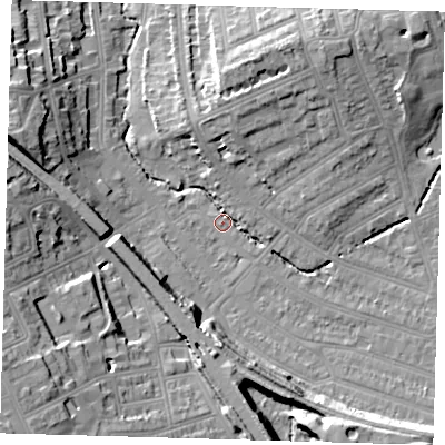 Shaded relief map of the ground around SE135LP, computed from Environment Agency LiDAR. The ground here sits at about 13 m above sea level and falls 22 m across the surrounding 800 m. Surface water reaching this point runs off ground lying to the north-east, 3.9 m higher.