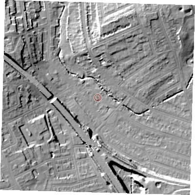 Shaded relief map of the ground around SE135LR, computed from Environment Agency LiDAR. The ground here sits at about 13 m above sea level and falls 22 m across the surrounding 800 m. Surface water reaching this point runs off ground lying to the north-north-east, 9.2 m higher.