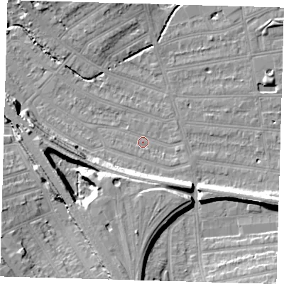 Shaded relief map of the ground around SE135LT, computed from Environment Agency LiDAR. The ground here sits at about 14 m above sea level and falls 16 m across the surrounding 800 m. Surface water reaching this point runs off ground lying to the east-south-east, 2.2 m higher.