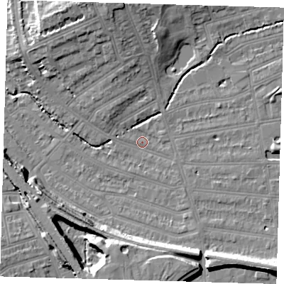 Shaded relief map of the ground around SE135RQ, computed from Environment Agency LiDAR. The ground here sits at about 14 m above sea level and falls 15 m across the surrounding 800 m. Surface water reaching this point runs off ground lying to the south, 13.7 m higher.