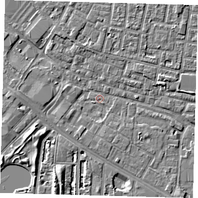 Shaded relief map of the ground around SE15DX, computed from Environment Agency LiDAR. The ground here sits at about 2 m above sea level and falls 7 m across the surrounding 800 m. Surface water reaching this point runs off ground lying to the west, 2.6 m higher.