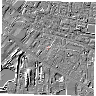 Shaded relief map of the ground around SE15JA, computed from Environment Agency LiDAR. The ground here sits at about 2 m above sea level and falls 7 m across the surrounding 800 m. Surface water reaching this point runs off ground lying to the south-west, 1.8 m higher.