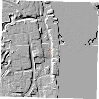 Shaded relief map of the ground around SE165GX, computed from Environment Agency LiDAR. The ground here sits at about 2 m above sea level and falls 12 m across the surrounding 800 m. Surface water reaching this point runs off ground lying to the west-south-west, 7.2 m higher.