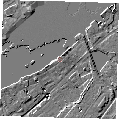 Shaded relief map of the ground around SE165QT, computed from Environment Agency LiDAR. The ground here sits at about 5 m above sea level and falls 19 m across the surrounding 800 m. Surface water reaching this point runs off ground lying to the north-north-east, 3.4 m higher.