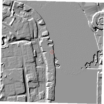 Shaded relief map of the ground around SE165UB, computed from Environment Agency LiDAR. The ground here sits at about 5 m above sea level and falls 12 m across the surrounding 800 m. Surface water reaching this point runs off ground lying to the north, 2.6 m higher.