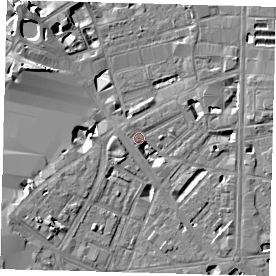 Shaded relief map of the ground around SE18NB, computed from Environment Agency LiDAR. The ground here sits at about 3 m above sea level and falls 12 m across the surrounding 800 m. Surface water reaching this point runs off ground lying to the south-east, 5.2 m higher.
