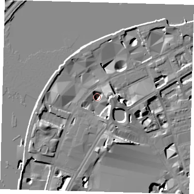 Shaded relief map of the ground around SE18YL, computed from Environment Agency LiDAR. The ground here sits at about -0 m above sea level and falls 13 m across the surrounding 800 m. Surface water reaching this point runs off ground lying to the east, 11.8 m higher.