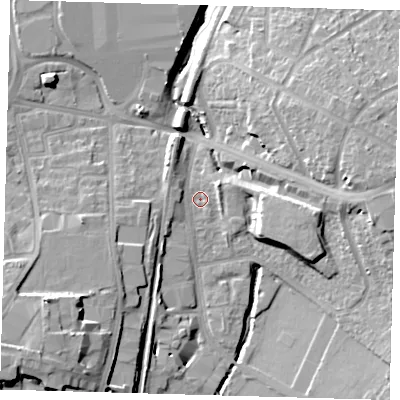 Shaded relief map of the ground around SE265BE, computed from Environment Agency LiDAR. The ground here sits at about 24 m above sea level and falls 19 m across the surrounding 800 m. Surface water reaching this point runs off ground lying to the south-west, 4.5 m higher.