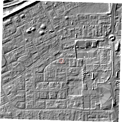 Shaded relief map of the ground around SE29JU, computed from Environment Agency LiDAR. The ground here sits at about 0 m above sea level and falls 8 m across the surrounding 800 m. Surface water reaching this point runs off ground lying to the east-south-east, 2.1 m higher.