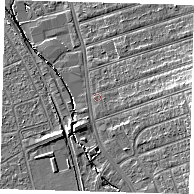 Shaded relief map of the ground around SE62PG, computed from Environment Agency LiDAR. The ground here sits at about 21 m above sea level and falls 14 m across the surrounding 800 m. Surface water reaching this point runs off ground lying to the east, 8.7 m higher.