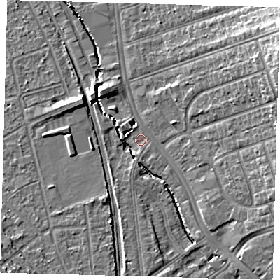 Shaded relief map of the ground around SE62XL, computed from Environment Agency LiDAR. The ground here sits at about 22 m above sea level and falls 15 m across the surrounding 800 m. Surface water reaching this point runs off ground lying to the south, 5.1 m higher.