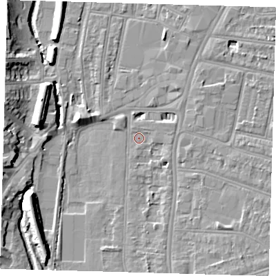 Shaded relief map of the ground around SE63AT, computed from Environment Agency LiDAR. The ground here sits at about 16 m above sea level and falls 11 m across the surrounding 800 m. Surface water reaching this point runs off ground lying to the east-north-east, 2.2 m higher.