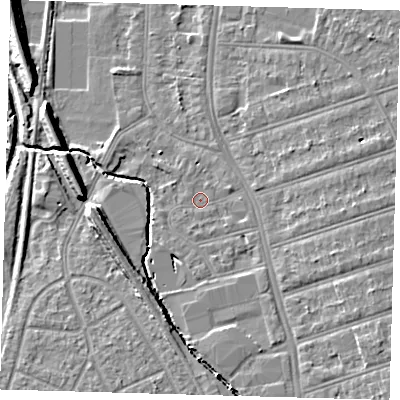 Shaded relief map of the ground around SE63BH, computed from Environment Agency LiDAR. The ground here sits at about 18 m above sea level and falls 9 m across the surrounding 800 m. Surface water reaching this point runs off ground lying to the east-north-east, 1.3 m higher.