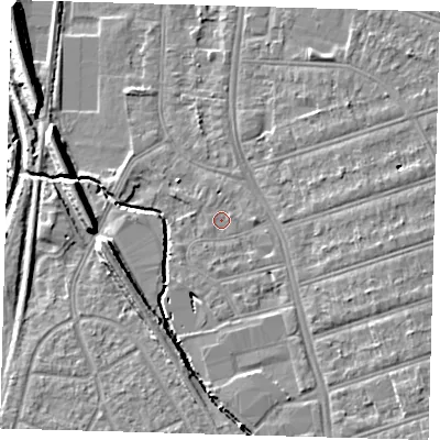 Shaded relief map of the ground around SE63BN, computed from Environment Agency LiDAR. The ground here sits at about 18 m above sea level and falls 9 m across the surrounding 800 m. Surface water reaching this point runs off ground lying to the east, 1.3 m higher.