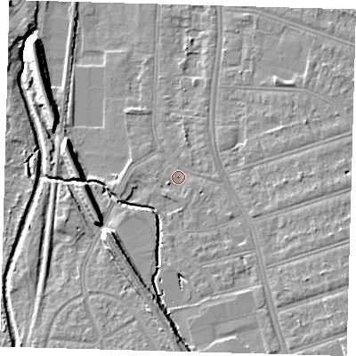 Shaded relief map of the ground around SE63BP, computed from Environment Agency LiDAR. The ground here sits at about 18 m above sea level and falls 10 m across the surrounding 800 m. Surface water reaching this point runs off ground lying to the south-east, 2.1 m higher.