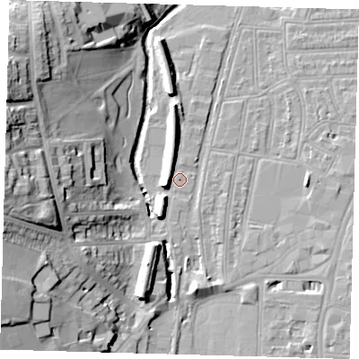 Shaded relief map of the ground around SE64BN, computed from Environment Agency LiDAR. The ground here sits at about 15 m above sea level and falls 28 m across the surrounding 800 m. Surface water reaching this point runs off ground lying to the west-south-west, 6.0 m higher.