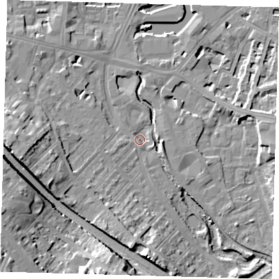 Shaded relief map of the ground around SE84AS, computed from Environment Agency LiDAR. The ground here sits at about 5 m above sea level and falls 21 m across the surrounding 800 m. Surface water reaching this point runs off ground lying to the south, 11.6 m higher.