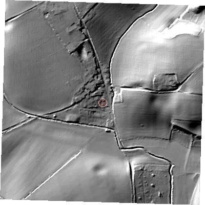 Shaded relief map of the ground around SG112JP, computed from Environment Agency LiDAR. The ground here sits at about 79 m above sea level and falls 32 m across the surrounding 800 m. Surface water reaching this point runs off ground lying to the east-north-east, 27.3 m higher.