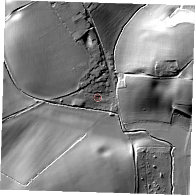 Shaded relief map of the ground around SG112JR, computed from Environment Agency LiDAR. The ground here sits at about 79 m above sea level and falls 32 m across the surrounding 800 m. Surface water reaching this point runs off ground lying to the north-north-west, 7.2 m higher.
