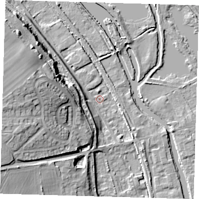Shaded relief map of the ground around SG128DG, computed from Environment Agency LiDAR. The ground here sits at about 29 m above sea level and falls 21 m across the surrounding 800 m. Surface water reaching this point runs off ground lying to the west-north-west, 20.2 m higher.