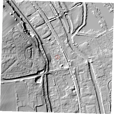 Shaded relief map of the ground around SG128DX, computed from Environment Agency LiDAR. The ground here sits at about 29 m above sea level and falls 20 m across the surrounding 800 m. Surface water reaching this point runs off ground lying to the west-north-west, 19.3 m higher.