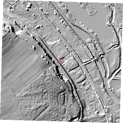 Shaded relief map of the ground around SG128EA, computed from Environment Agency LiDAR. The ground here sits at about 29 m above sea level and falls 27 m across the surrounding 800 m. Surface water reaching this point runs off ground lying to the west-south-west, 15.2 m higher.