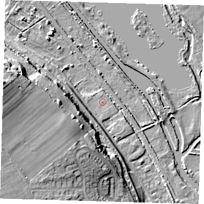 Shaded relief map of the ground around SG128EB, computed from Environment Agency LiDAR. The ground here sits at about 30 m above sea level and falls 29 m across the surrounding 800 m. Surface water reaching this point runs off ground lying to the west, 25.6 m higher.
