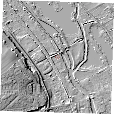 Shaded relief map of the ground around SG128EU, computed from Environment Agency LiDAR. The ground here sits at about 29 m above sea level and falls 20 m across the surrounding 800 m. Surface water reaching this point runs off ground lying to the south-west, 1.8 m higher.