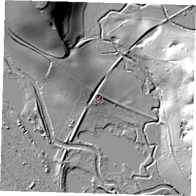 Shaded relief map of the ground around SG128LZ, computed from Environment Agency LiDAR. The ground here sits at about 36 m above sea level and falls 42 m across the surrounding 800 m. Surface water reaching this point runs off ground lying to the north-west, 9.2 m higher.
