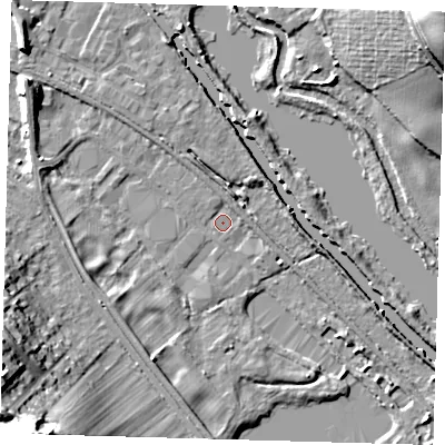Shaded relief map of the ground around SG129QN, computed from Environment Agency LiDAR. The ground here sits at about 31 m above sea level and falls 30 m across the surrounding 800 m. Surface water reaching this point runs off ground lying to the north-west, 7.4 m higher.