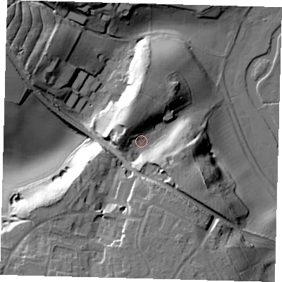 Shaded relief map of the ground around SG142HZ, computed from Environment Agency LiDAR. The ground here sits at about 57 m above sea level and falls 32 m across the surrounding 800 m. Surface water reaching this point runs off ground lying to the south, 15.1 m higher.