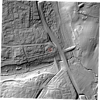 Shaded relief map of the ground around SG28JE, computed from Environment Agency LiDAR. The ground here sits at about 77 m above sea level and falls 24 m across the surrounding 800 m. Surface water reaching this point runs off ground lying to the west, 6.3 m higher.