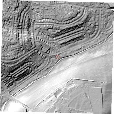 Shaded relief map of the ground around SG49NS, computed from Environment Agency LiDAR. The ground here sits at about 63 m above sea level and falls 31 m across the surrounding 800 m. Surface water reaching this point runs off ground lying to the west-north-west, 24.6 m higher.