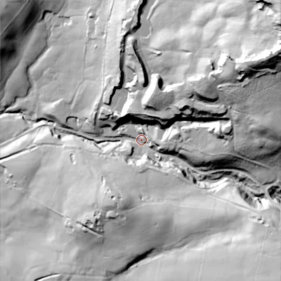 Shaded relief map of the ground around SK105RX, computed from Environment Agency LiDAR. The ground here sits at about 245 m above sea level and falls 122 m across the surrounding 800 m. Surface water reaching this point runs off ground lying to the east-north-east, 94.3 m higher.