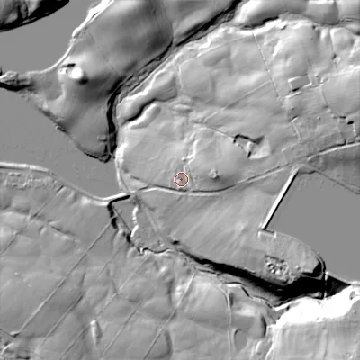 Shaded relief map of the ground around SK110NE, computed from Environment Agency LiDAR. The ground here sits at about 220 m above sea level and falls 55 m across the surrounding 800 m. Surface water reaching this point runs off ground lying to the east, 12.9 m higher.