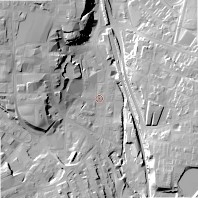 Shaded relief map of the ground around SK116JE, computed from Environment Agency LiDAR. The ground here sits at about 133 m above sea level and falls 27 m across the surrounding 800 m. Surface water reaching this point runs off ground lying to the north-west, 22.7 m higher.