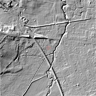 Shaded relief map of the ground around SK121XF, computed from Environment Agency LiDAR. The ground here sits at about 87 m above sea level and falls 11 m across the surrounding 800 m. Surface water reaching this point runs off ground lying to the north-west, 6.9 m higher.