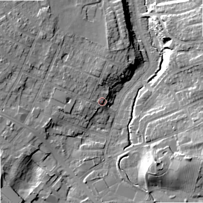 Shaded relief map of the ground around SK74JE, computed from Environment Agency LiDAR. The ground here sits at about 84 m above sea level and falls 18 m across the surrounding 800 m. Surface water reaching this point runs off ground lying to the north-west, 7.2 m higher.