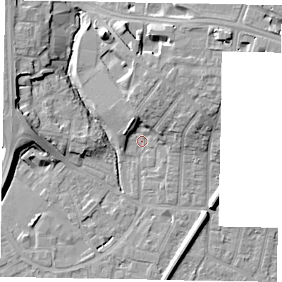 Shaded relief map of the ground around SL12QD, computed from Environment Agency LiDAR. The ground here sits at about 21 m above sea level and falls 13 m across the surrounding 800 m. Surface water reaching this point runs off ground lying to the north-north-east, 8.6 m higher.