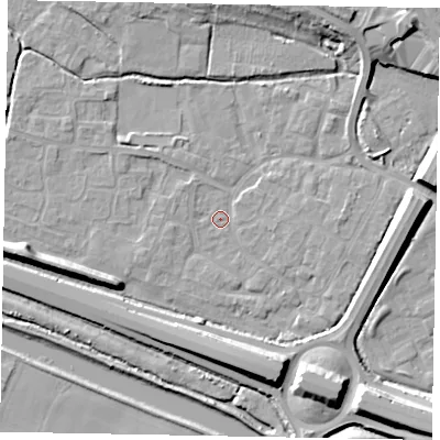 Shaded relief map of the ground around SL12TE, computed from Environment Agency LiDAR. The ground here sits at about 21 m above sea level and falls 11 m across the surrounding 800 m. Surface water reaching this point runs off ground lying to the north-north-east, 9.2 m higher.