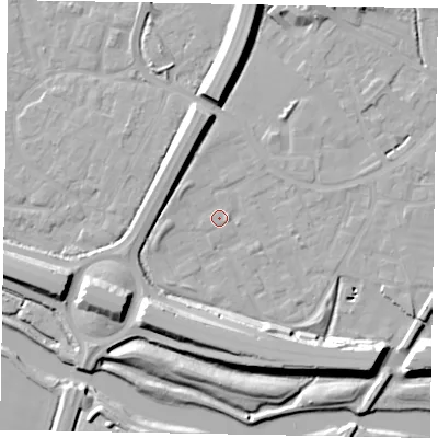 Shaded relief map of the ground around SL12TP, computed from Environment Agency LiDAR. The ground here sits at about 21 m above sea level and falls 14 m across the surrounding 800 m. Surface water reaching this point runs off ground lying to the south-east, 13.6 m higher.