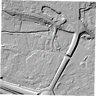Shaded relief map of the ground around SL12UA, computed from Environment Agency LiDAR. The ground here sits at about 21 m above sea level and falls 11 m across the surrounding 800 m. Surface water reaching this point runs off ground lying to the north, 10.7 m higher.